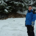 Invasion of the snow-goons!  Justin with his snowman.