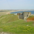 View eastwards from the top. The grey bunker is where the gun is.