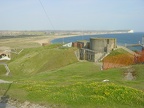 View eastwards from the top. The grey bunker is where the gun is.
