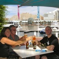 Micha, Dad, and July enjoying a coldie at Darling Harbour, Sydney