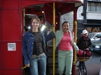 Uli and Arcelia stepping off a Routemaster bus