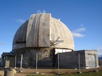 the burnt out shell of one of the domes at Mt Stromlo Observatory