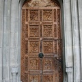 The carved wooden entrace door of Constance Cathedral