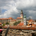 Juinor with an imposing backdrop of ?eský Krumlov and the castle