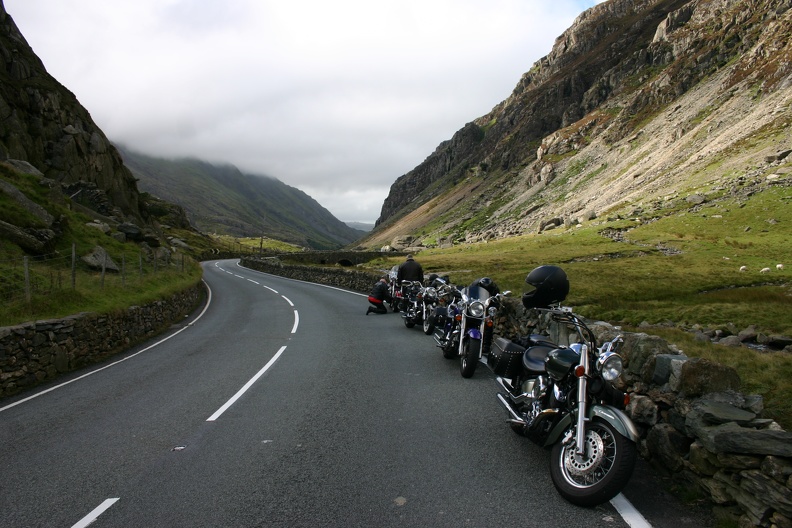 Bikes lined up in the picturesque Welsh mountains
