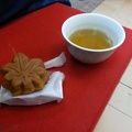 Miyajima specialty: sweet bean-bun shaped like maple leaf with tea.