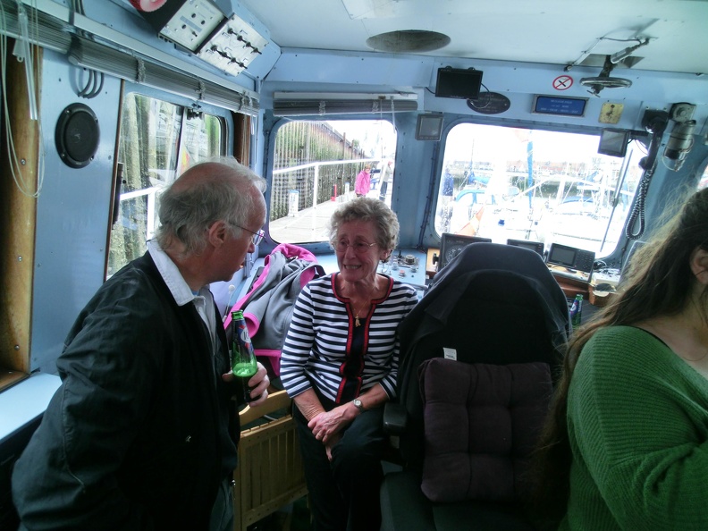 Soon the rain came down and everybody crammed into the wheel house.